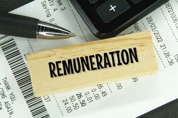receipts, pens, calculators and wooden boards with the word remuneration