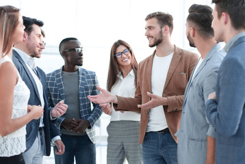 businessman talking with employees.