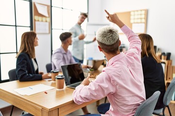 Group of business workers listening boss conference during meeting at the office.