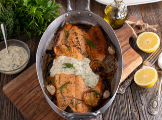 Oven baked half salmon with homemade tartar sauce