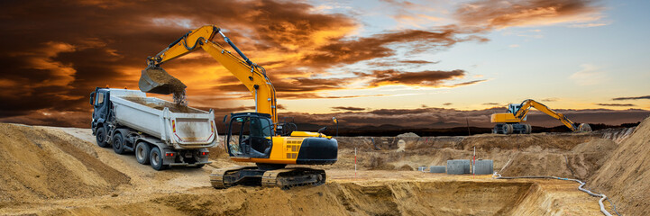 heavy excavator working on construction site © Wolfilser