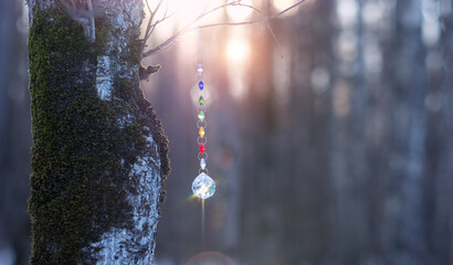 Crystal prism Refracting light on abstract blurred natural background. Magic Witchcraft Ritual,...