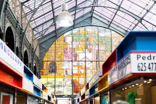 Malaga, Spain - May 24, 2019: Glass mosaic wall inside the Atarazanas Market bulding.