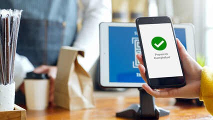 QR code payment, customer using smartphone for paying at shop