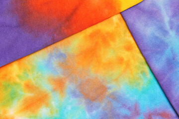 Abstract tie dye multicolor folded fabric cloth Boho pattern texture for background or groovy wedding card, sale flyer, 60s, 70s poster, tie-dye diy backdrop. Modern Watercolor Wet Brush Fabrics Art