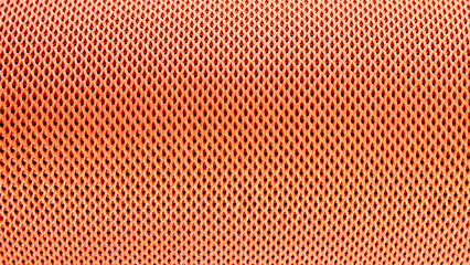 Details, texture of mesh cloth fabric, orange color. abstract texture and background