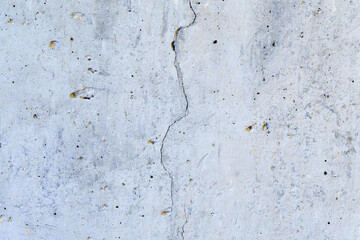 Gray cement texture with cracks and scratch. selective focus.