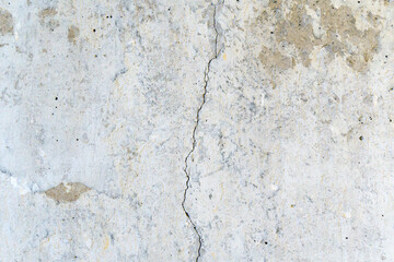 Obraz premium Crack on concrete wall texture, background, selective focus