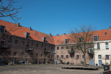 Fototapeta premium Hoorn, Netherlands, March 2022. The courtyard of the former prison on the Oostereiland in Hoorn.