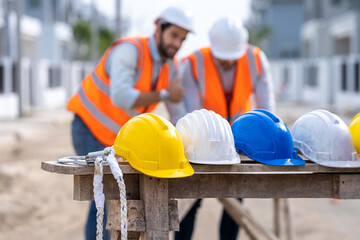 Yellow,white and blue hard safety helmet hat for safety project of workman or engineer in...