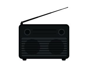Old black radio with antenna. Vintage radio or audio device.