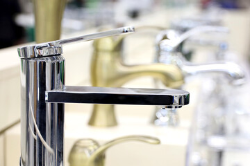 Water taps for the kitchen and bathroom in the plumbing store
