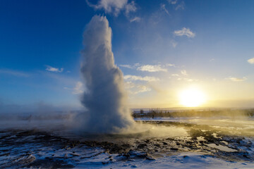 View of Strokkur geyser at sunset. Iceland.