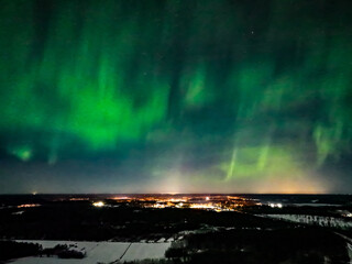 Aurora Borealis, Northern lights above the countyside of Finland 01