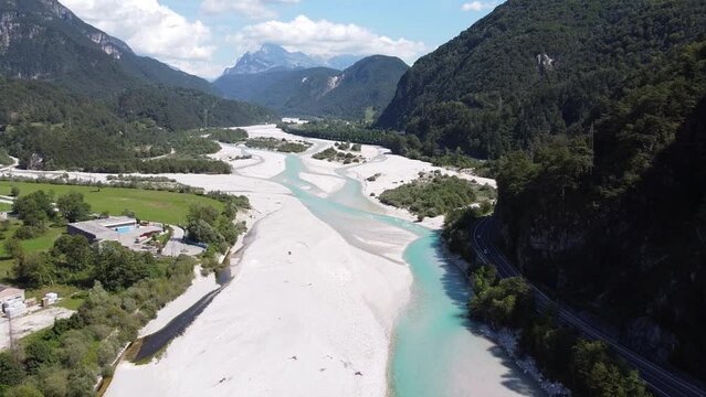 Tagliamento River at Tolmezzo, Udine, Italian Alps, Italy - Aerial Drone View of the Riverbed and Streaming Blue Gletsjer Water