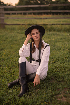 portrait of a woman in a cowboy hat on ferm