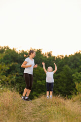 mother and daughter walking in nature