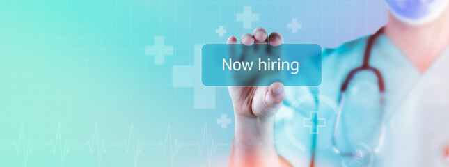Now hiring. Doctor holds virtual card in hand. Medicine digital