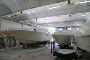 Indoor shipyard of speed boats in construction.