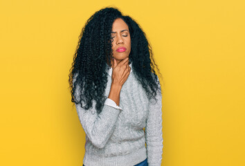 Middle age african american woman wearing casual clothes touching painful neck, sore throat for flu, clod and infection