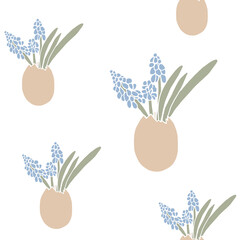 Happy Easter. Modern flat Easter seamless pattern on white background with eggs and spring flowers. Aesthetics of spring. Cute pattern for textiles and festive packaging. Easter decor. Hello april