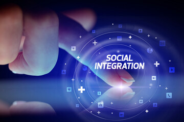 Finger touching tablet with social media icons concept