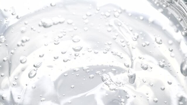 Macro white transparent cosmetic serum gel, cream, fluid texture with air bubble