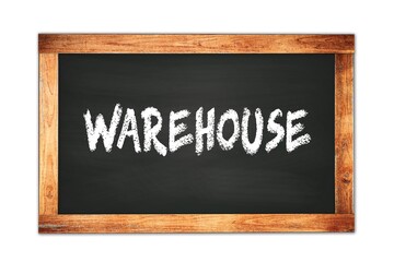 Fototapeta premium WAREHOUSE text written on wooden frame school blackboard.