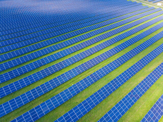 Solar cell energy farm. High angle view of solar panels on an energy farm. full frame background texture.