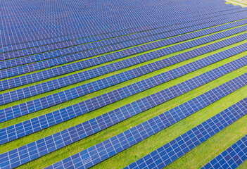 Solar cell energy farm. High angle view of solar panels on an energy farm. full frame background texture.
