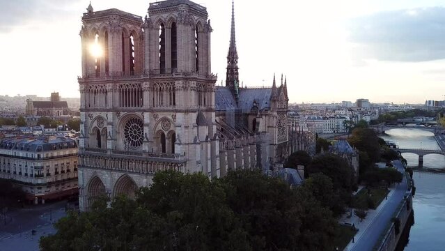 Bright morning sun shining through windows in church tower. Gothic cathedral Notre-Dame, Paris, France. by Lelab360