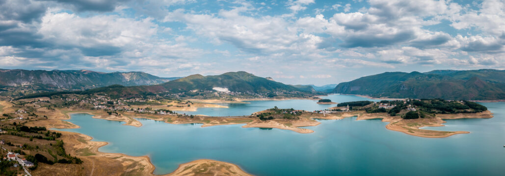 Panoramic aerial view of Rama Lake with a few small town along the coast, Bosnia and Herzegovina.