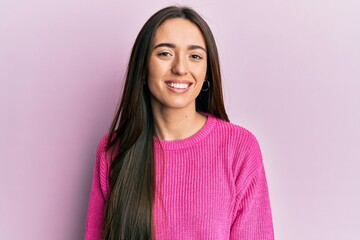 Fototapeta premium Young hispanic girl wearing casual clothes with a happy and cool smile on face. lucky person.