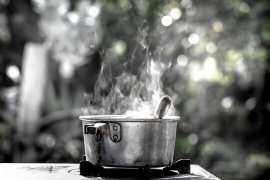 Steam Over Cooking Pot In Kitchen