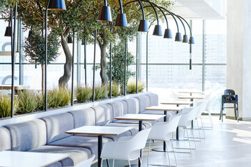 Background image of empty food court interior in shopping mall with tables and chairs in neutral grey tones lit by sunlight, copy space