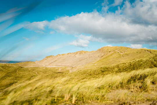 Sandy hill with grass in the foreground in Strandhill, Co. Sligo, Ireland