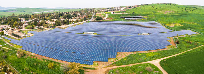 Aerial view of solar panels on a hill side, Beit HaShita, Israel.