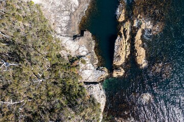 tasmanian coastal landscape in australia. aerial photos of rocky ocean views in southern tasmania. showing towns and farms.