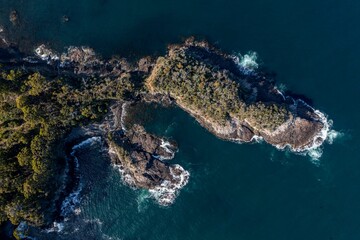 tasmanian coastal landscape in australia. aerial photos of rocky ocean views in southern tasmania. showing towns and farms.