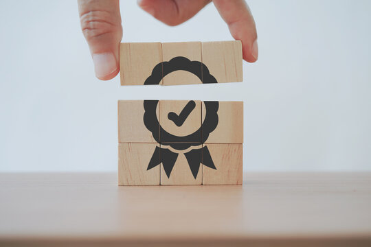 hand complete sign of top service quality assurance, guarantee, standards, ISO certification and standardization concept, advertising product and service quality commitment