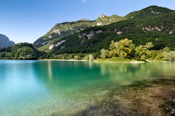 Spring at the alpine lake of Tenno. Trento province, Trentino Alto-Adige, Italy, Europe.