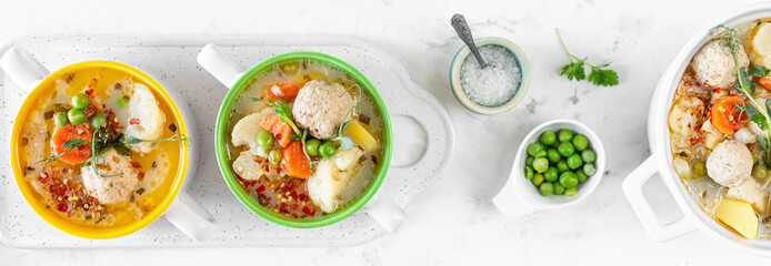 Banner. Spring soup with meatballs and vegetables.