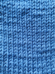 Fototapeta premium Knitted fabric close-up, fabric texture