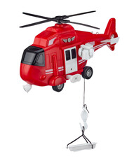 Red toy rescue helicopter with a rescue cradle on a cord, isolated on a white background. Rescue and evacuation from hard-to-reach places.