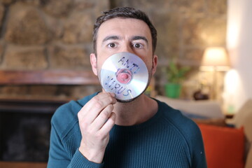 Comedian wearing antivirus cd protective mask