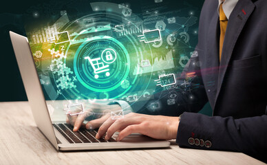 Business hand typing on a modern laptop