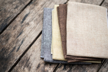 Close up group fabric on wood table.