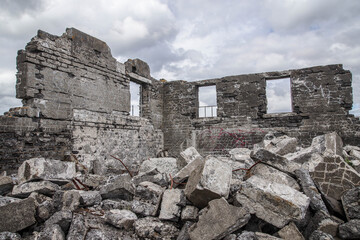 Low angle shot of stone ruins under a stormy sky in Iceland © Gauti Eiríksson/Wirestock Creators