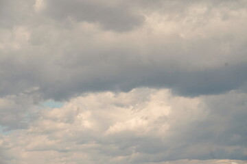 Fluffy White Clouds in Blue Sky