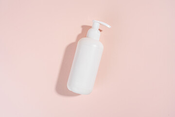 Blank white Bottles for Cosmetics, Mock up Cream Jar on a Pink light background, Packaging for Cosmetics without logo and label
